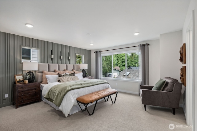 bedroom with recessed lighting, light colored carpet, and baseboards