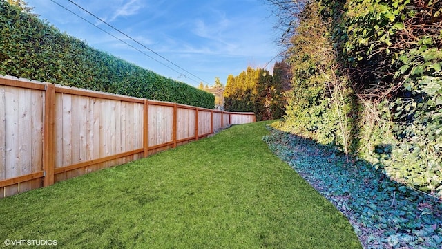 view of yard featuring fence