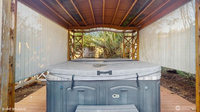 exterior details featuring a hot tub