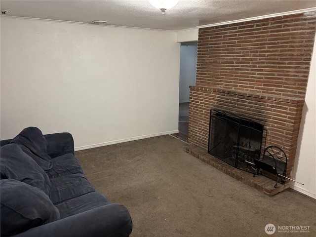 unfurnished living room with a textured ceiling, carpet flooring, crown molding, baseboards, and a brick fireplace