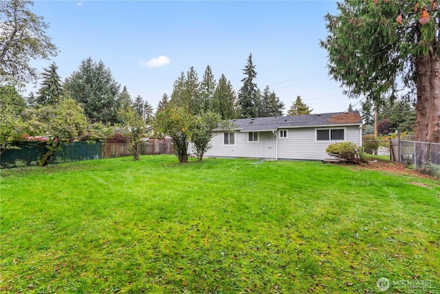 view of yard featuring a fenced backyard