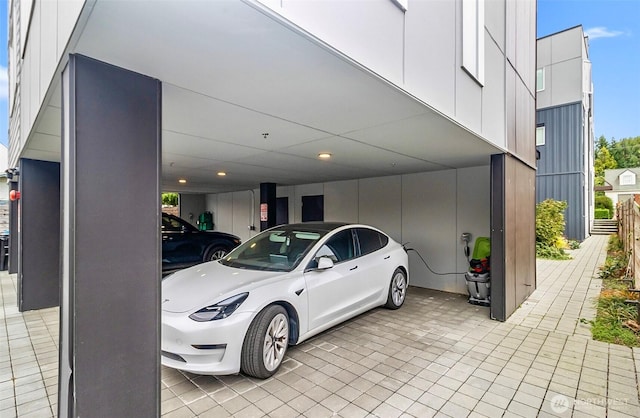 view of car parking with fence