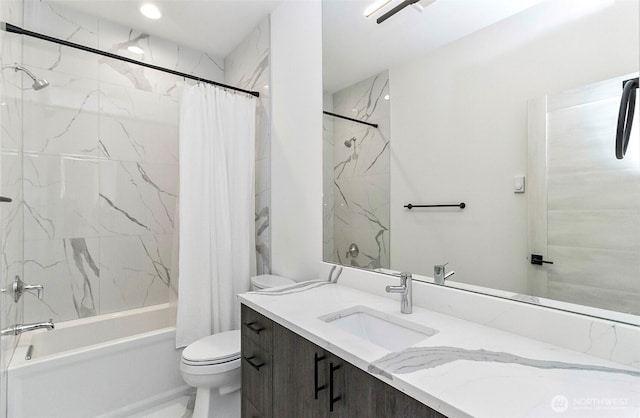 full bath featuring marble finish floor, toilet, shower / bath combo with shower curtain, and vanity