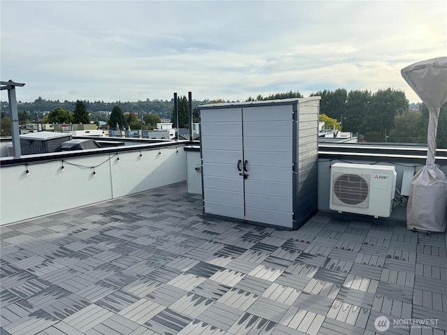 view of outbuilding with ac unit