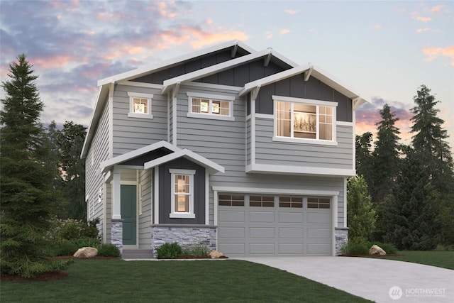 craftsman-style home with concrete driveway, a garage, stone siding, a lawn, and board and batten siding