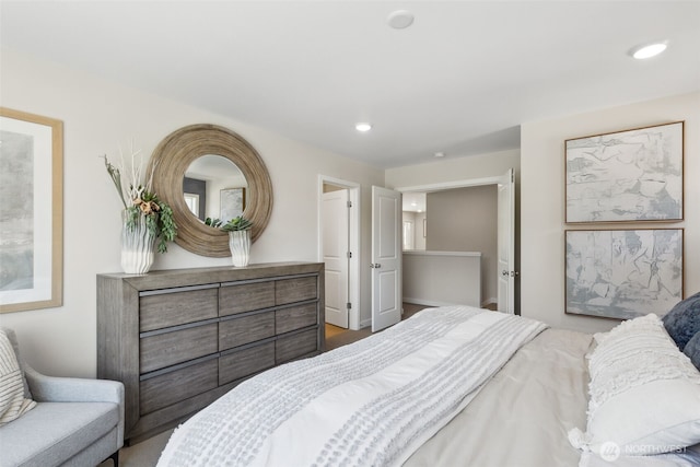 bedroom with recessed lighting