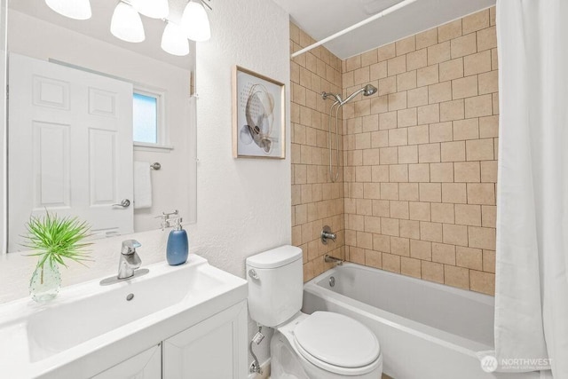 bathroom with toilet, a textured wall, and shower / bathtub combination with curtain