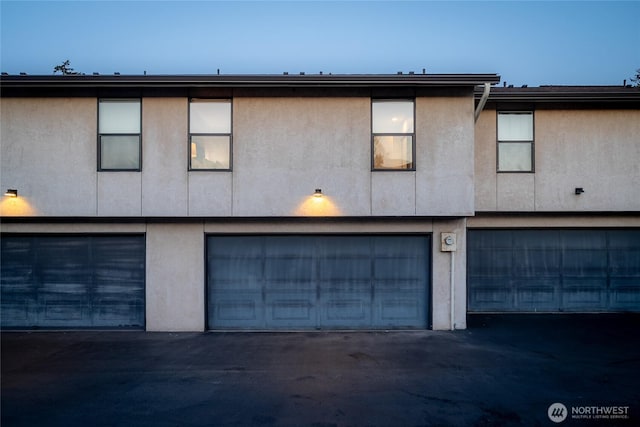 exterior space with stucco siding