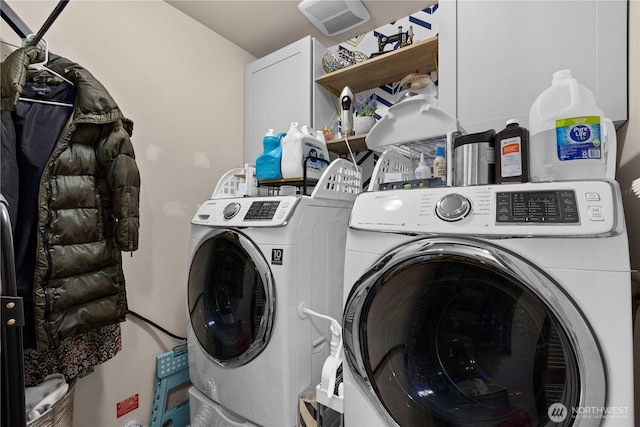 laundry area with laundry area and washing machine and dryer