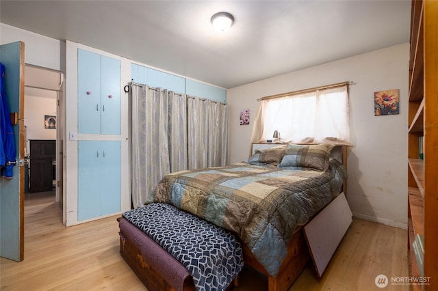 bedroom with light wood-style flooring