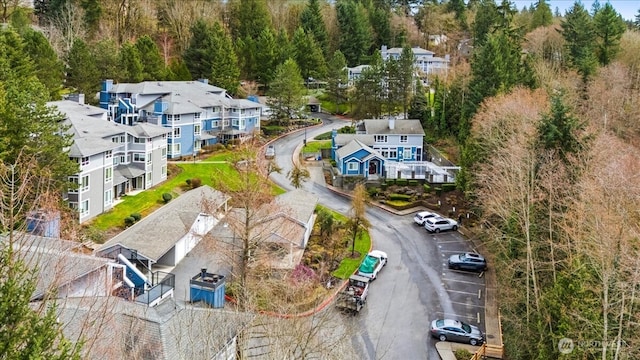 birds eye view of property with a residential view