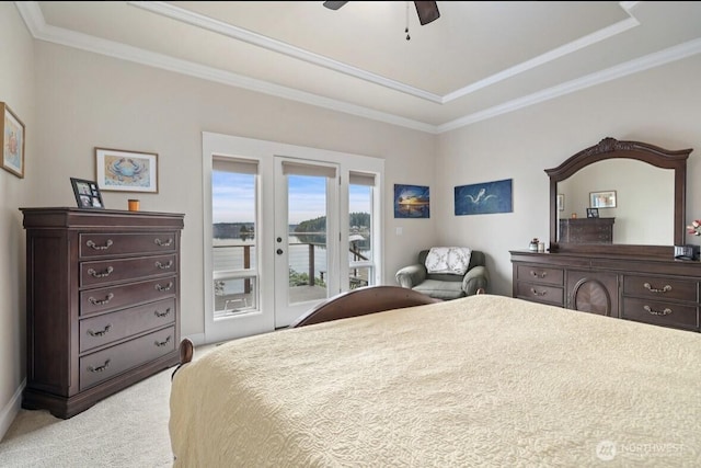 bedroom with a ceiling fan, light colored carpet, crown molding, and access to outside