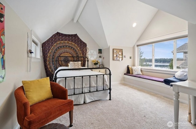 carpeted bedroom featuring lofted ceiling with beams, baseboards, and a water view