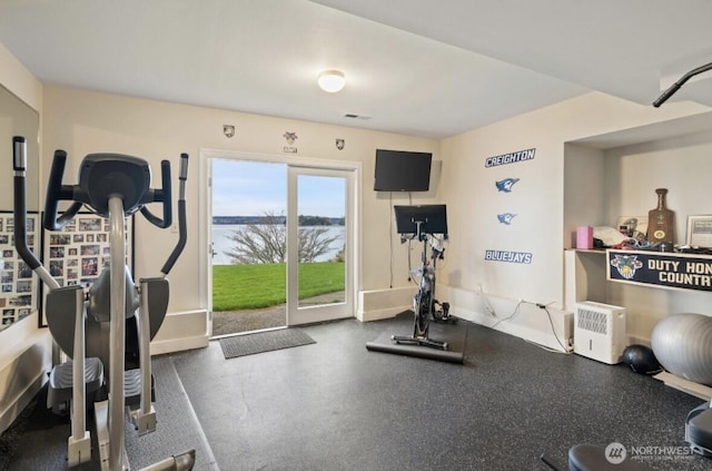 exercise room with baseboards