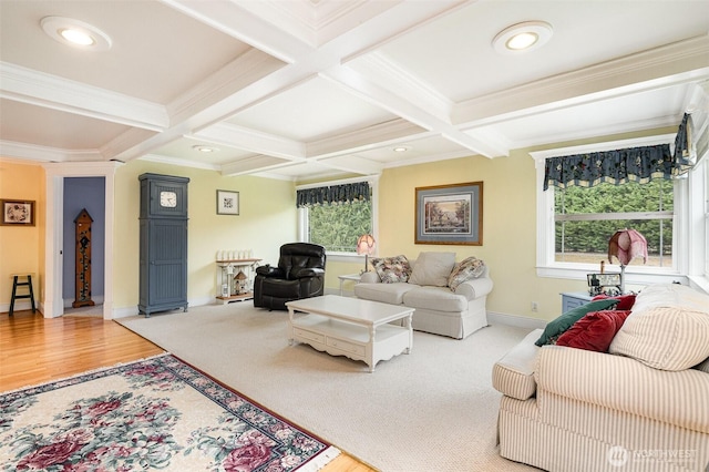 living area with beam ceiling, coffered ceiling, and ornamental molding