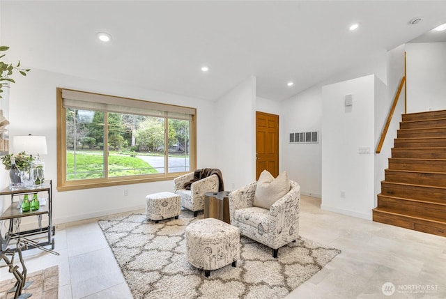 sitting room with recessed lighting, visible vents, stairway, and vaulted ceiling