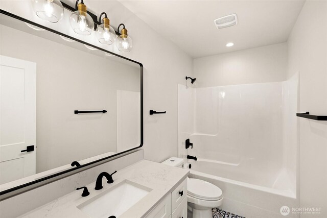 full bathroom with visible vents, toilet, recessed lighting, vanity, and  shower combination