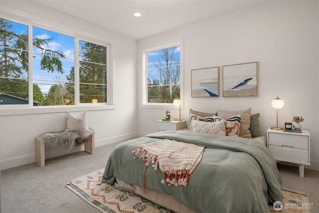 bedroom with recessed lighting, baseboards, and carpet