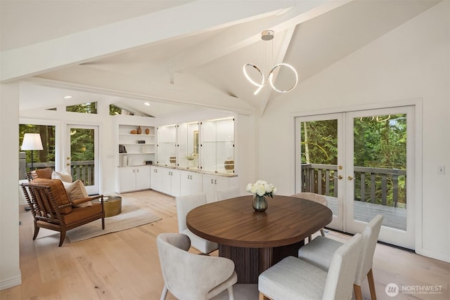 dining area featuring light wood-style flooring, recessed lighting, french doors, an inviting chandelier, and vaulted ceiling with beams