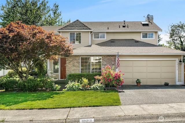 19013 112th Pl SE, Renton, WA 98055 - view of front facade featuring an attached garage, a front lawn, a chimney, asphalt driveway, and roof with shingles