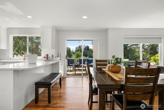 19013 112th Pl SE, Renton, WA 98055 - dining room featuring wood finished floors and recessed lighting