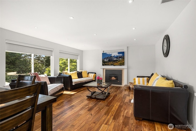 19013 112th Pl SE, Renton, WA 98055 - living area featuring wood finished floors, a lit fireplace, and recessed lighting