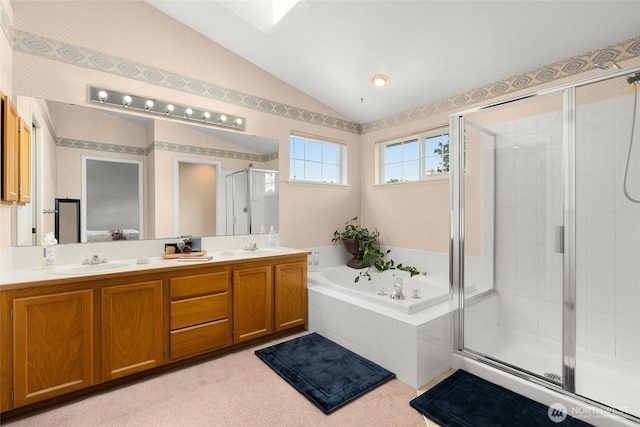 19013 112th Pl SE, Renton, WA 98055 - full bath with lofted ceiling, a stall shower, a garden tub, and double vanity