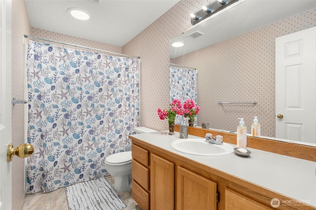 19013 112th Pl SE, Renton, WA 98055 - bathroom with toilet, tile patterned floors, vanity, curtained shower, and wallpapered walls