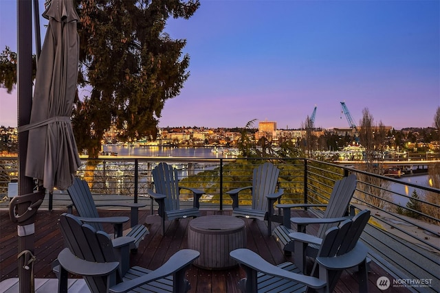 deck at dusk with a water view