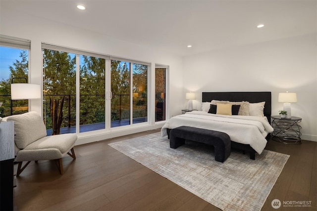 bedroom featuring recessed lighting, baseboards, and dark wood-style flooring