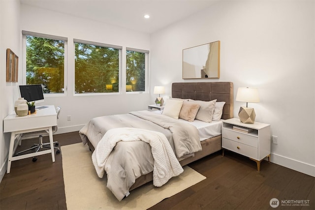 bedroom with recessed lighting, baseboards, and dark wood-type flooring