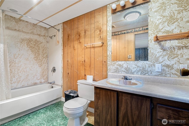 bathroom featuring toilet, wallpapered walls, vanity, and shower / bathtub combination with curtain