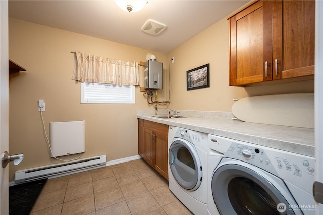 washroom featuring washing machine and clothes dryer, light tile patterned flooring, cabinet space, water heater, and a baseboard heating unit