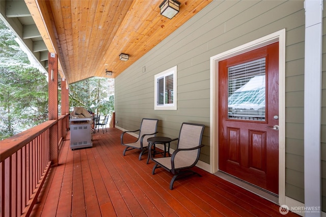 wooden deck featuring a porch