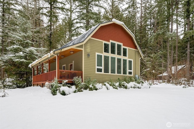 view of snow covered property