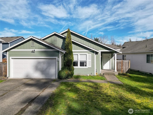 view of front of home featuring board and batten siding, concrete driveway, a garage, and a front yard