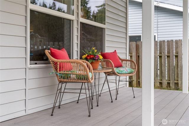 wooden deck featuring fence