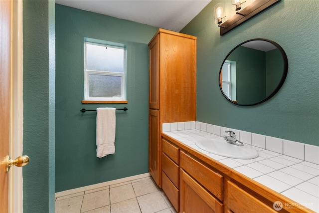 bathroom featuring tile patterned floors and vanity