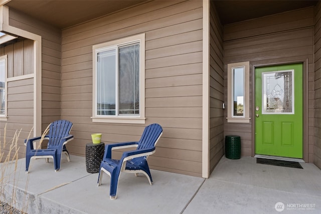 doorway to property with a patio