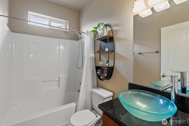 full bath featuring vanity, toilet, and shower / tub combo with curtain