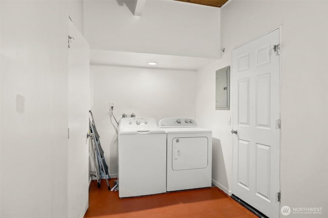 clothes washing area featuring laundry area, electric panel, and independent washer and dryer