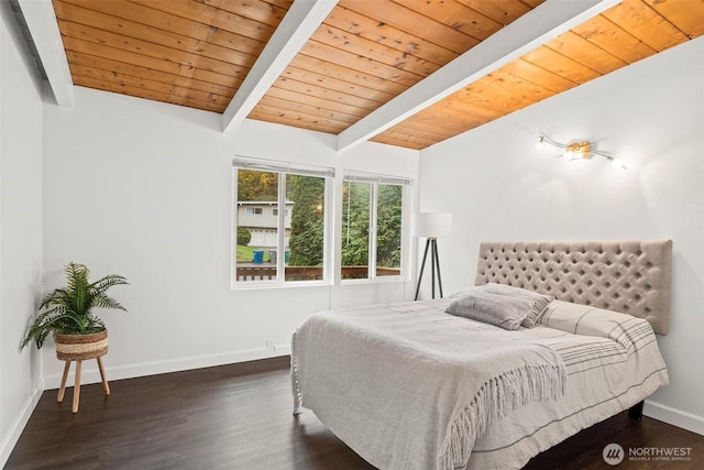 bedroom featuring wood ceiling, vaulted ceiling with beams, baseboards, and wood finished floors