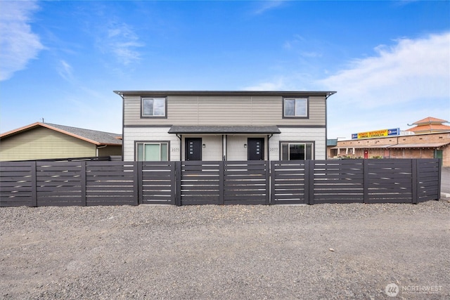 view of front of house featuring a fenced front yard