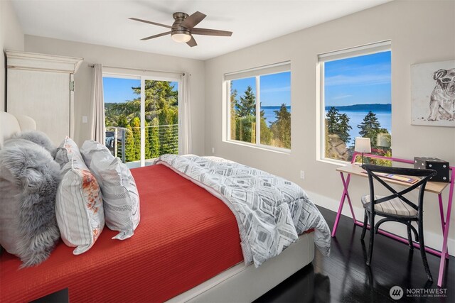 bedroom with access to exterior, ceiling fan, and wood finished floors