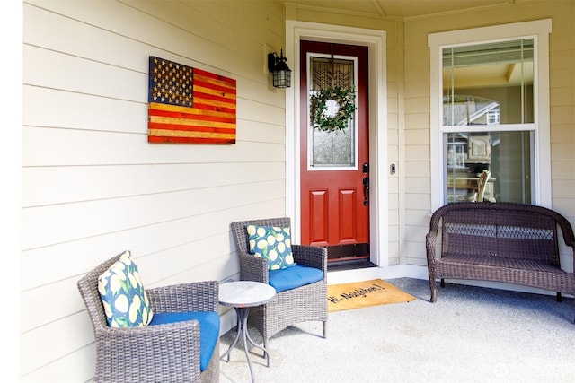 doorway to property featuring covered porch