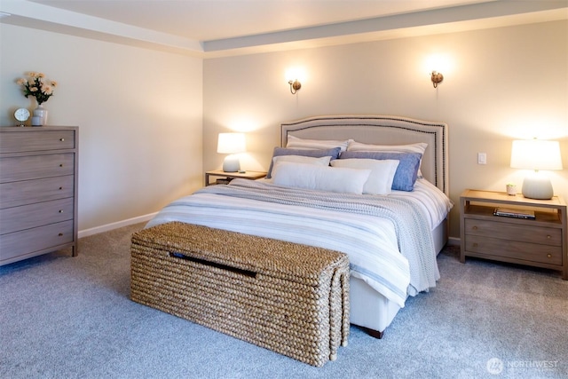 bedroom with baseboards and carpet