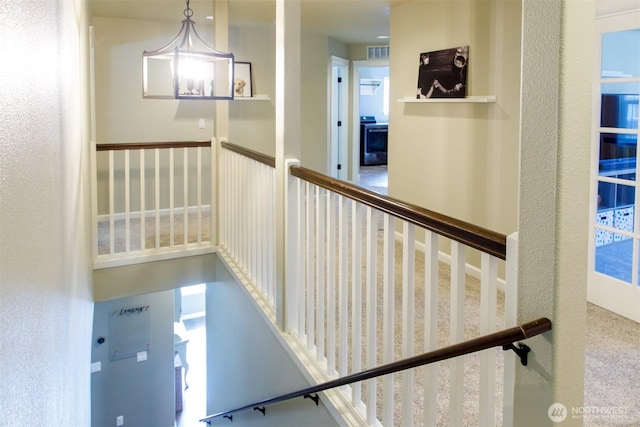 hallway with visible vents