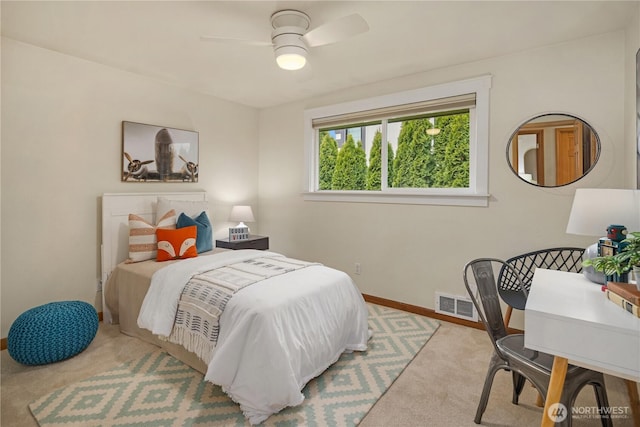 bedroom featuring visible vents, baseboards, carpet, and ceiling fan