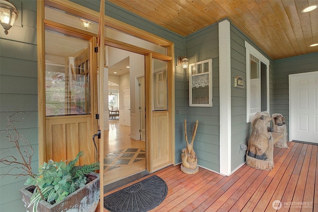 doorway to property with covered porch