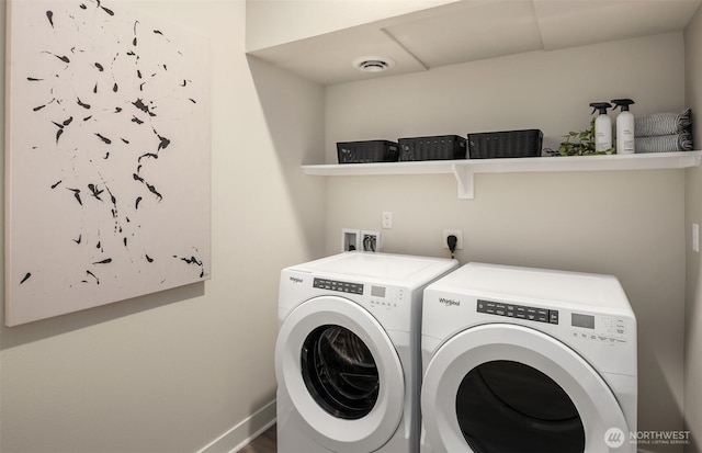 washroom with washer and dryer, laundry area, baseboards, and visible vents